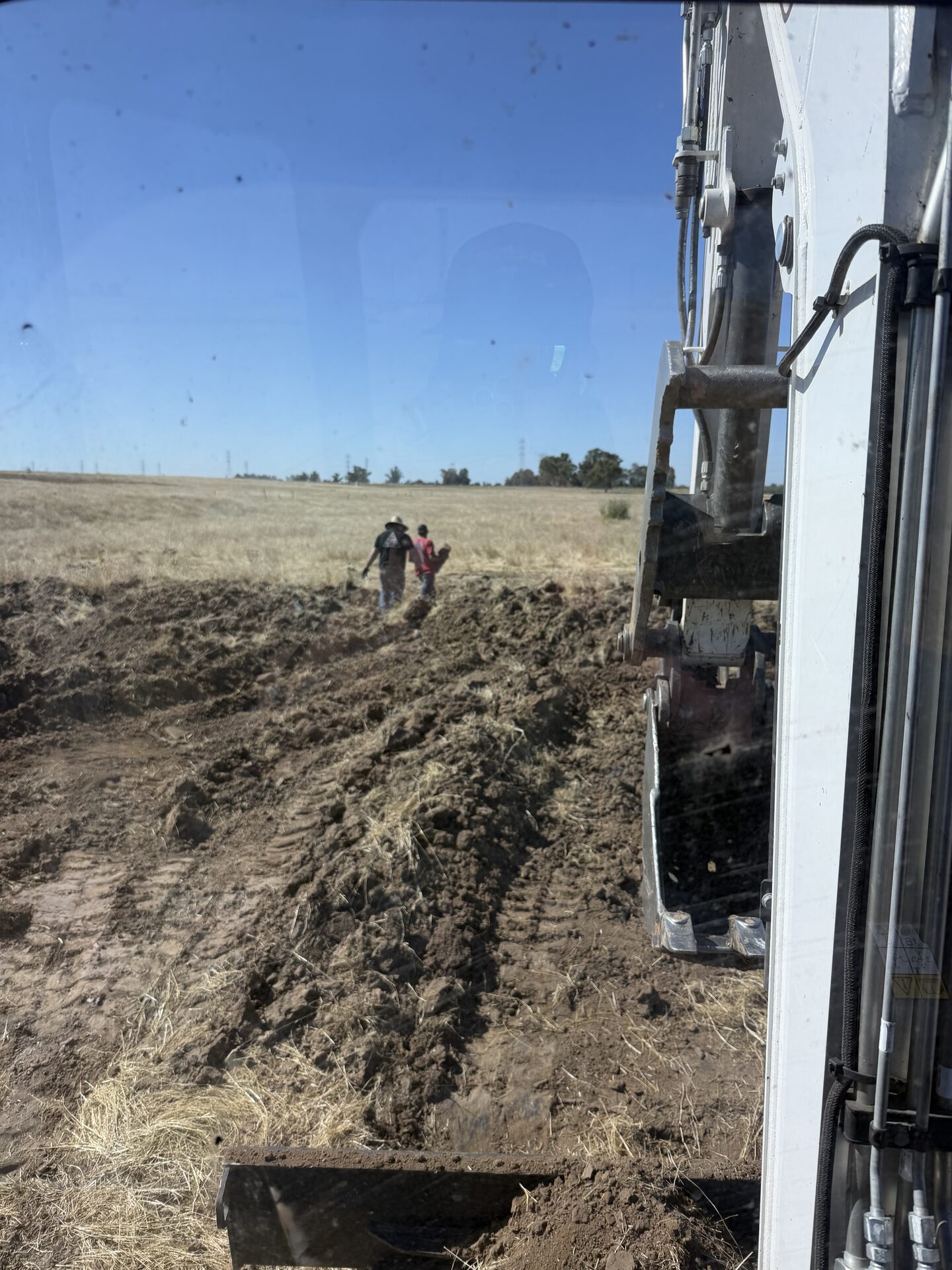 CKJ Ag Services crew racing the rain on a Central Valley property cleanup